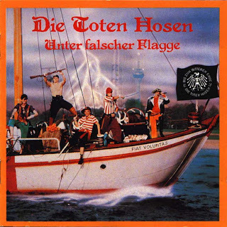 Die Toten Hosen - Unter Falscher Flagge - Tekst piosenki, lyrics | Tekściki.pl