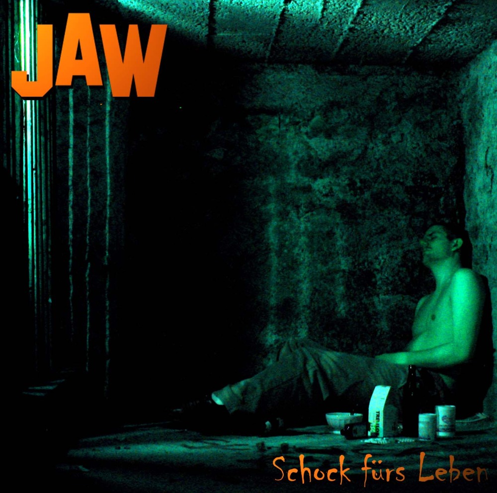 JAW - Schock fürs Leben - Tekst piosenki, lyrics | Tekściki.pl