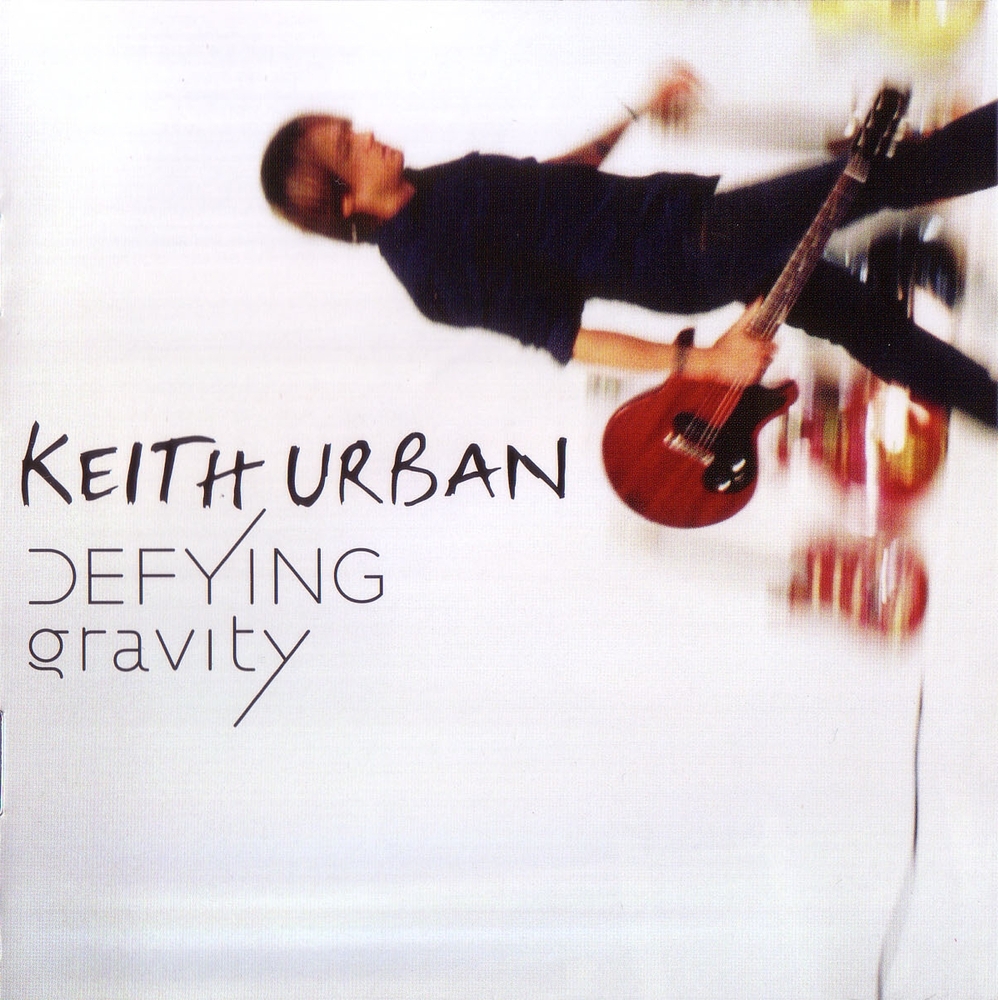 Keith Urban - Defying Gravity - Tekst piosenki, lyrics | Tekściki.pl