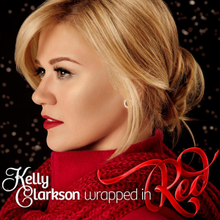 Kelly Clarkson - Wrapped in Red - Tekst piosenki, lyrics | Tekściki.pl