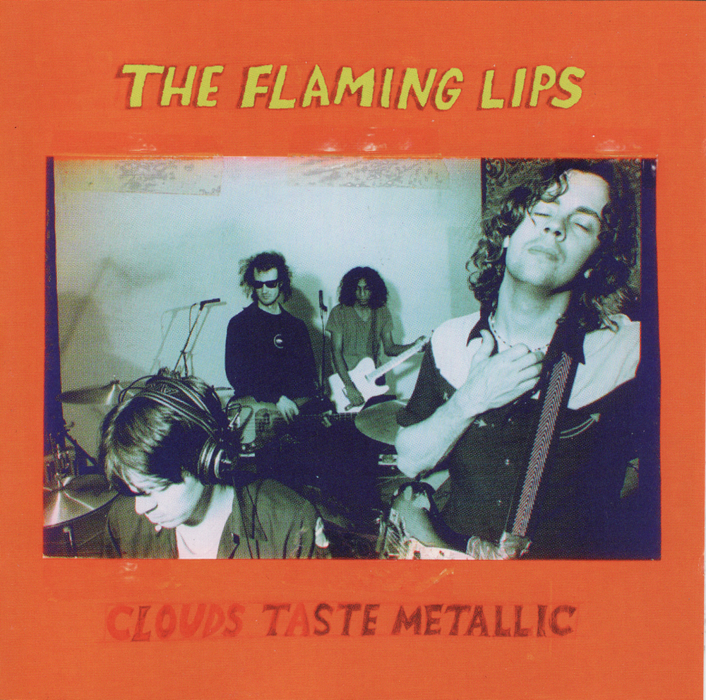 The Flaming Lips - Clouds Taste Metallic - Tekst piosenki, lyrics | Tekściki.pl