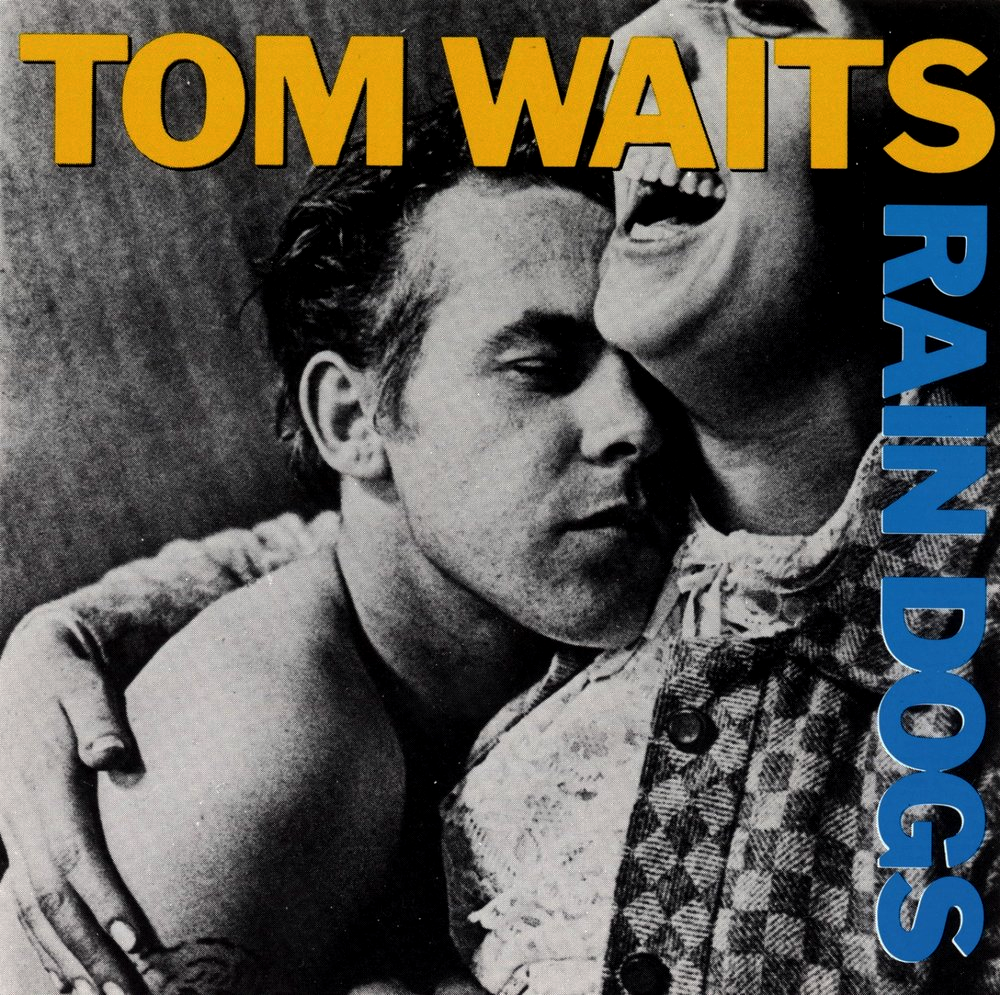 Tom Waits - Rain Dogs - Tekst piosenki, lyrics | Tekściki.pl