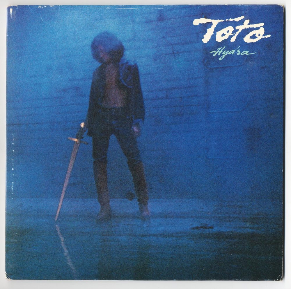 Toto - Hydra - Tekst piosenki, lyrics | Tekściki.pl