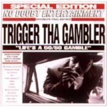 Trigger Tha Gambler - Life's a 50/50 Gamble - Tekst piosenki, lyrics | Tekściki.pl
