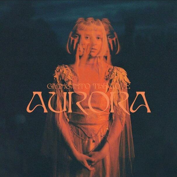 Aurora - Giving In To The Love - Tekst piosenki, lyrics - teksciki.pl