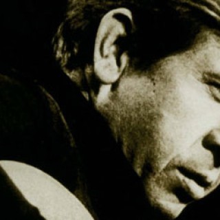Buck Owens - I've Got a Tiger By the Tail - Tekst piosenki, lyrics - teksciki.pl