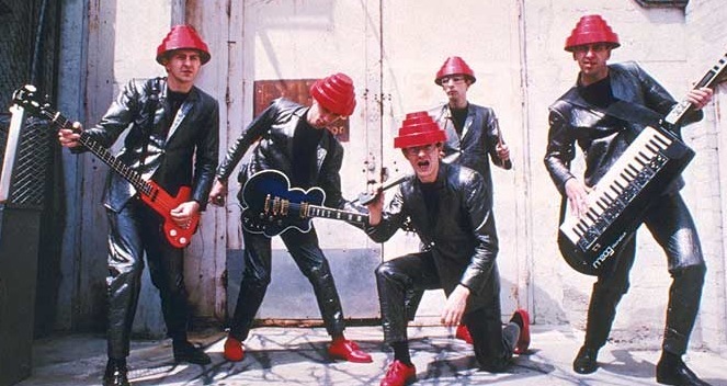 Devo - Auto Modown - Tekst piosenki, lyrics - teksciki.pl