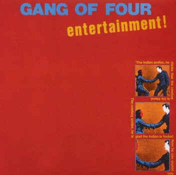 Gang of Four - At Home He's A Tourist - Tekst piosenki, lyrics - teksciki.pl