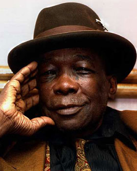 John Lee Hooker - Just me and my telephone - Tekst piosenki, lyrics - teksciki.pl