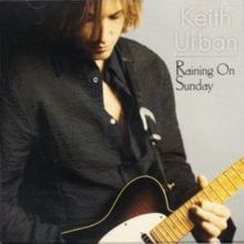 Keith Urban - Raining On Sunday - Tekst piosenki, lyrics - teksciki.pl