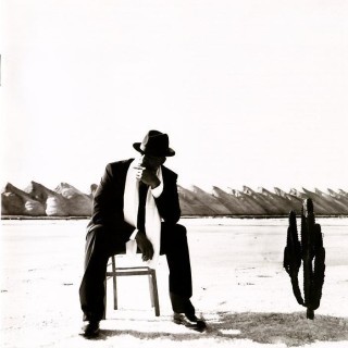 Oxmo Puccino - Un flingue et des roses - Tekst piosenki, lyrics - teksciki.pl