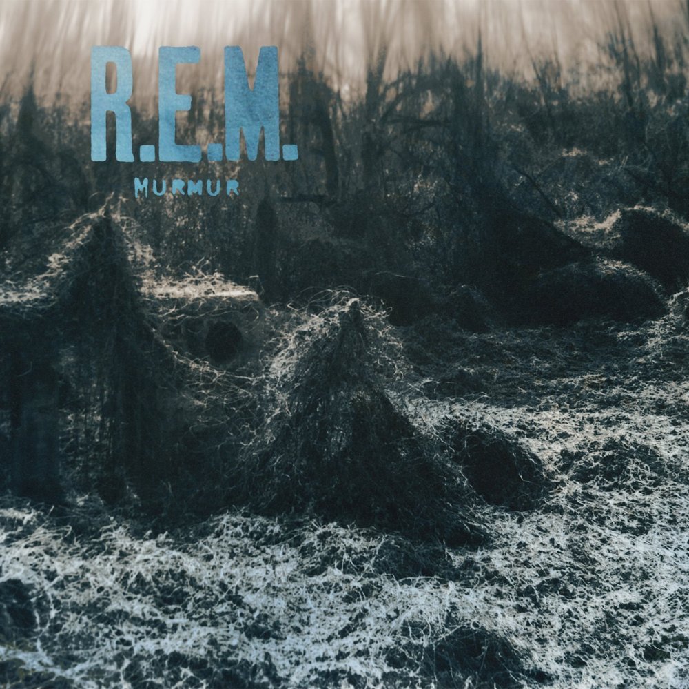 R.E.M. - Laughing - Tekst piosenki, lyrics - teksciki.pl