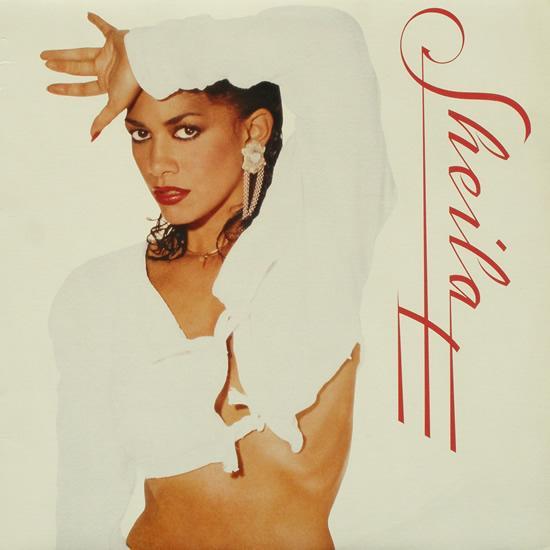 Sheila E - Love on a Blue Train - Tekst piosenki, lyrics - teksciki.pl