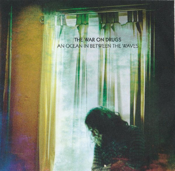 The War on Drugs - An Ocean In Between The Waves - Tekst piosenki, lyrics - teksciki.pl
