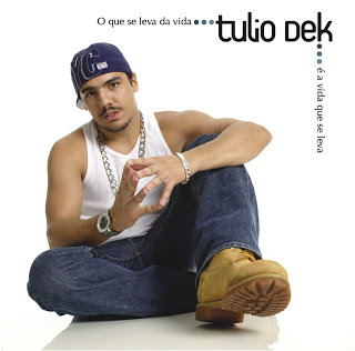 Túlio Dek - A Inversão - Tekst piosenki, lyrics - teksciki.pl